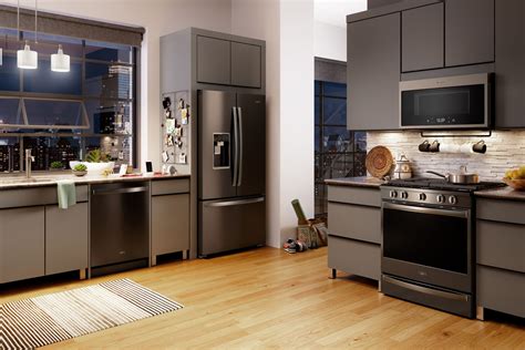 what color cabinets go best with black stainless steel appliances|brown kitchen cabinets black appliances.